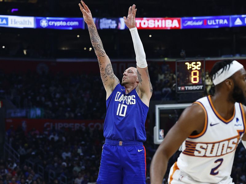 LOS ANGELES, CALIFORNIA - JANUARY 08: Daniel Theis #10 of the LA Clippers takes a shot against the Phoenix Suns in the first half at Crypto.com Arena on January 08, 2024 in Los Angeles, California.  NOTE TO USER: User expressly acknowledges and agrees that, by downloading and/or using this photograph, user is consenting to the terms and conditions of the Getty Images License Agreement.  (Photo by Ronald Martinez/Getty Images)