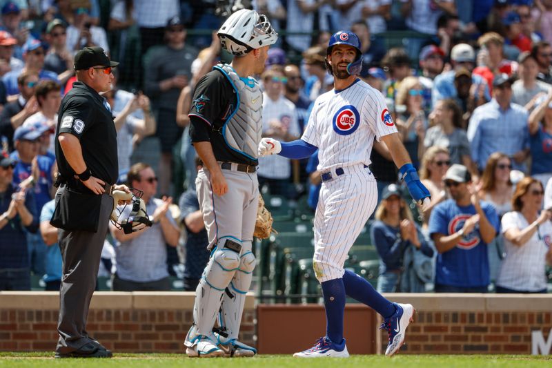 May 5, 2023; Chicago, Illinois, USA; Chicago Cubs shortstop Dansby Swanson (7) scores against the Miami Marlins during the fifth inning at Wrigley Field. Mandatory Credit: Kamil Krzaczynski-USA TODAY Sports