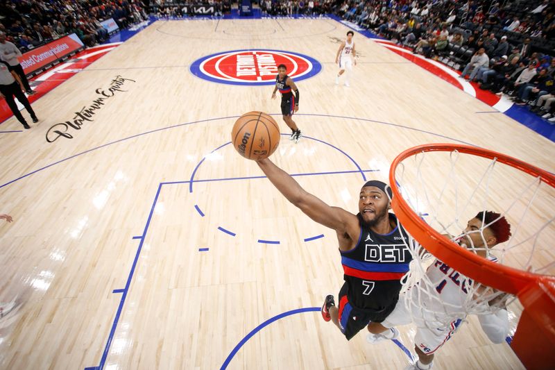 DETROIT, MI - NOVEMBER 30:  Paul Reed #7 of the Detroit Pistons grabs the rebound during the game against the Philadelphia 76ers during a regular season game on November 30, 2024 at Little Caesars Arena in Detroit, Michigan. NOTE TO USER: User expressly acknowledges and agrees that, by downloading and/or using this photograph, User is consenting to the terms and conditions of the Getty Images License Agreement. Mandatory Copyright Notice: Copyright 2024 NBAE (Photo by Brian Sevald/NBAE via Getty Images)