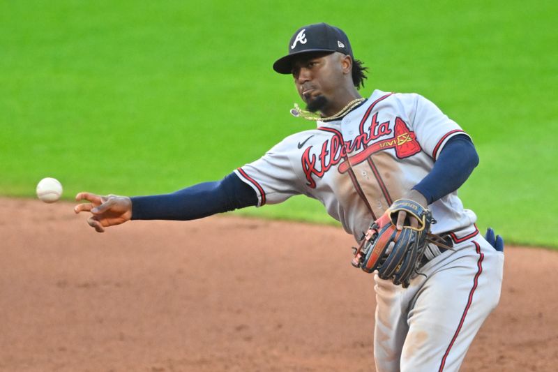 Jul 5, 2023; Cleveland, Ohio, USA; Atlanta Braves second baseman Ozzie Albies (1) throws to first base in the fourth inning against the Cleveland Guardians at Progressive Field. Mandatory Credit: David Richard-USA TODAY Sports