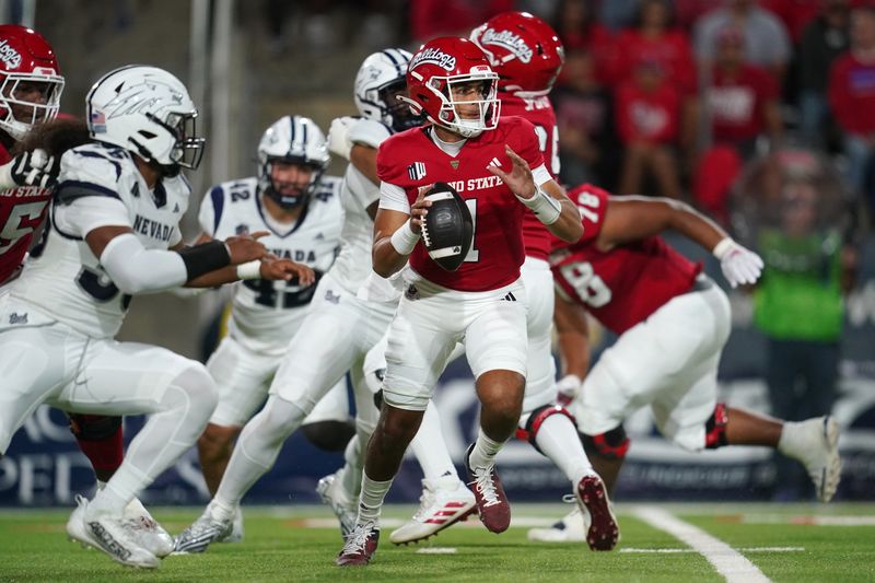 Sep 30, 2023; Fresno, California, USA; Fresno State Bulldogs quarterback Mikey Keene (1) looks to throw a pass against the Nevada Wolf Pack in the first quarter at Valley Children's Stadium. Mandatory Credit: Cary Edmondson-USA TODAY Sports