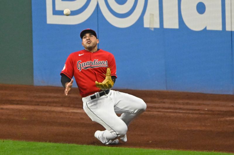 Aug 23, 2023; Cleveland, Ohio, USA; Cleveland Guardians right fielder Ramon Laureano (10) makes a sliding catch in the second inning against the Los Angeles Dodgers at Progressive Field. Mandatory Credit: David Richard-USA TODAY Sports