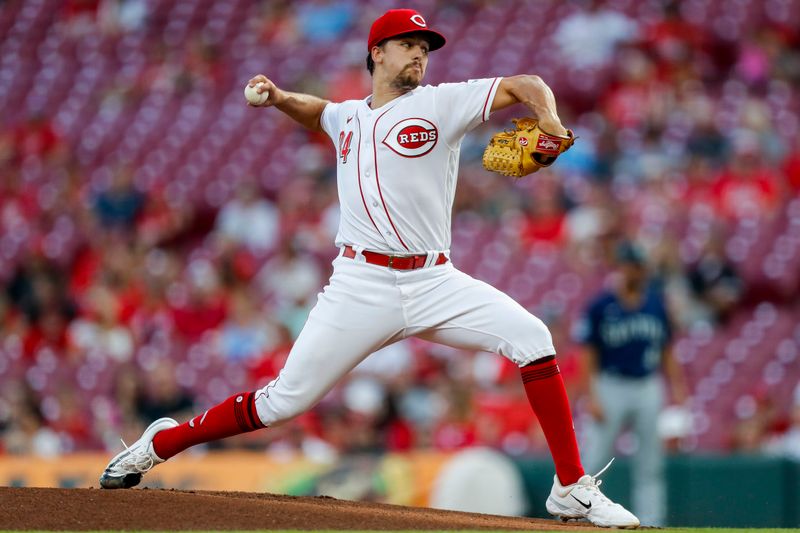 Sep 5, 2023; Cincinnati, Ohio, USA; Cincinnati Reds starting pitcher Connor Phillips (34) pitches against the Seattle Mariners in the first inning at Great American Ball Park. Mandatory Credit: Katie Stratman-USA TODAY Sports