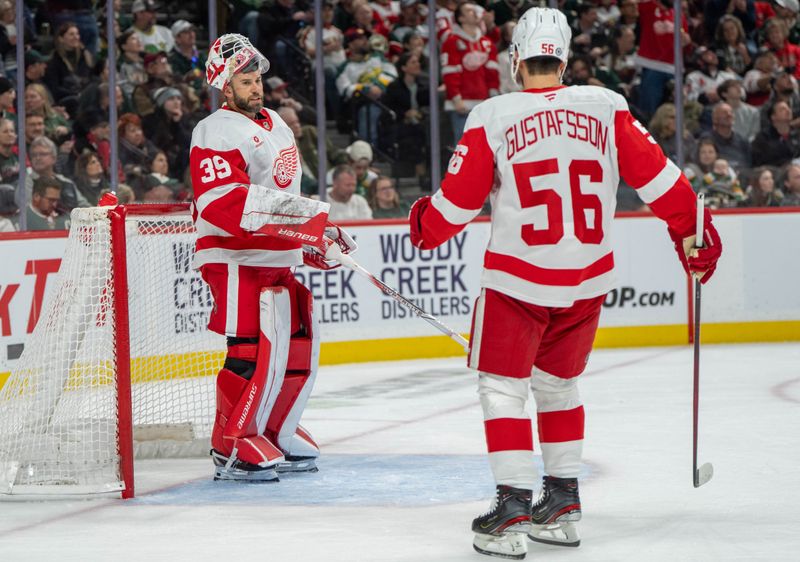 Feb 25, 2025; Saint Paul, Minnesota, USA; Detroit Red Wings goaltender Cam Talbot (39) congratulates defenseman Erik Gustafsson (56) on scoring against the Minnesota Wild in the second period at Xcel Energy Center. Mandatory Credit: Matt Blewett-Imagn Images