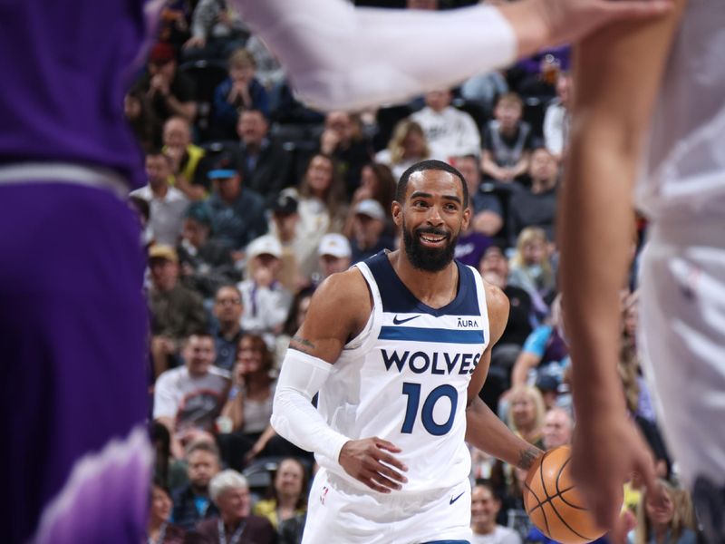 SALT LAKE CITY, UT - MARCH 18: Mike Conley #10 of the Minnesota Timberwolves handles the ball during the game against the Utah Jazz on March 18, 2024 at Delta Center in Salt Lake City, Utah. NOTE TO USER: User expressly acknowledges and agrees that, by downloading and or using this Photograph, User is consenting to the terms and conditions of the Getty Images License Agreement. Mandatory Copyright Notice: Copyright 2024 NBAE (Photo by Melissa Majchrzak/NBAE via Getty Images)