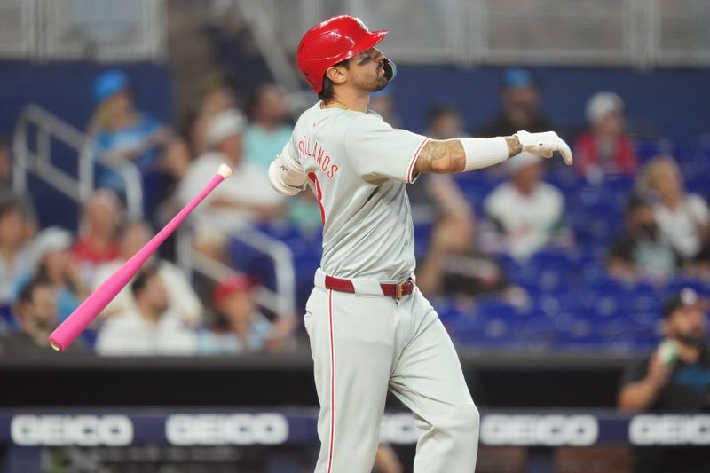 May 12, 2024; Miami, Florida, USA;  Philadelphia Phillies right fielder Nick Castellanos (8) hits a three-run home run in the first inning against the Miami Marlins at loanDepot Park. Mandatory Credit: Jim Rassol-USA TODAY Sports