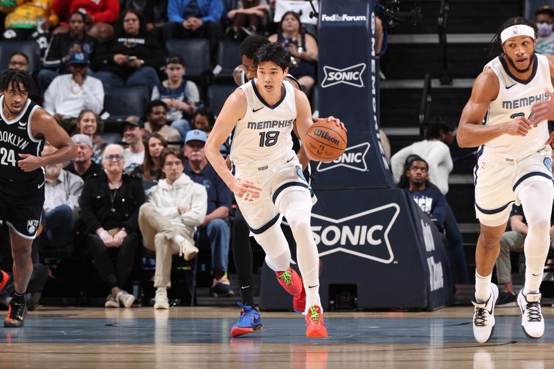 MEMPHIS, TN - February 26:  Yuta Watanabe #18 of the Memphis Grizzlies handles the ball during the game against the Brooklyn Nets on February 26, 2024 at FedExForum in Memphis, Tennessee. NOTE TO USER: User expressly acknowledges and agrees that, by downloading and or using this photograph, User is consenting to the terms and conditions of the Getty Images License Agreement. Mandatory Copyright Notice: Copyright 2024 NBAE (Photo by Joe Murphy/NBAE via Getty Images)