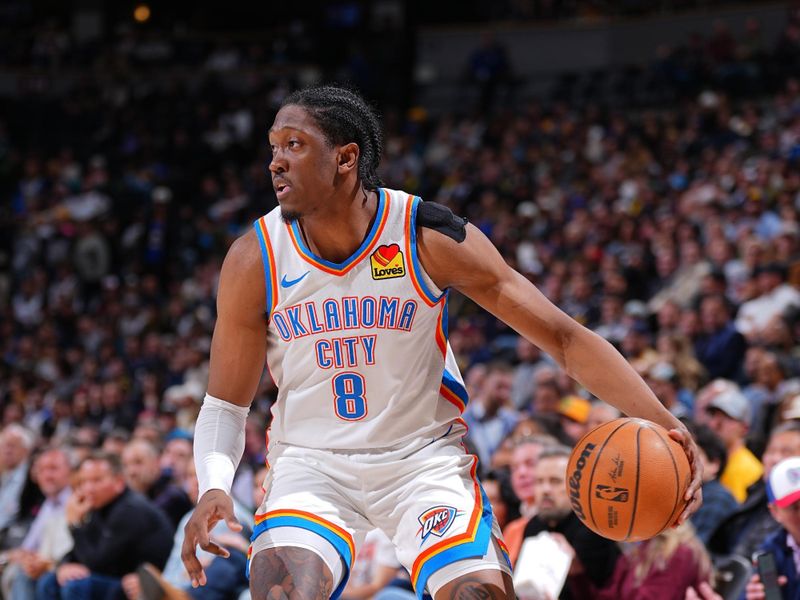 DENVER, CO - NOVEMBER 6: Jalen Williams #8 of the Oklahoma City Thunder dribbles the ball during the game against the Denver Nuggets on November 6, 2024 at Ball Arena in Denver, Colorado. NOTE TO USER: User expressly acknowledges and agrees that, by downloading and/or using this Photograph, user is consenting to the terms and conditions of the Getty Images License Agreement. Mandatory Copyright Notice: Copyright 2024 NBAE (Photo by Garrett Ellwood/NBAE via Getty Images)