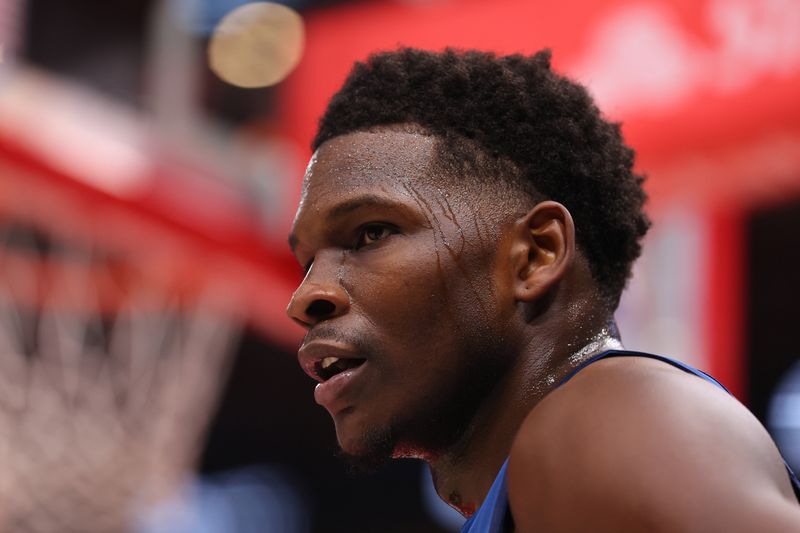 CHICAGO, ILLINOIS - FEBRUARY 06: Anthony Edwards #5 of the Minnesota Timberwolves looks on against the Chicago Bulls during the first half at the United Center on February 06, 2024 in Chicago, Illinois. NOTE TO USER: User expressly acknowledges and agrees that, by downloading and or using this photograph, User is consenting to the terms and conditions of the Getty Images License Agreement.  (Photo by Michael Reaves/Getty Images)