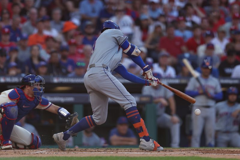 Oct 6, 2024; Philadelphia, Pennsylvania, USA; New York Mets outfielder Brandon Nimmo (9) hits a single in the third inning against the Philadelphia Phillies during game two of the NLDS for the 2024 MLB Playoffs at Citizens Bank Park. Mandatory Credit: Bill Streicher-Imagn Images