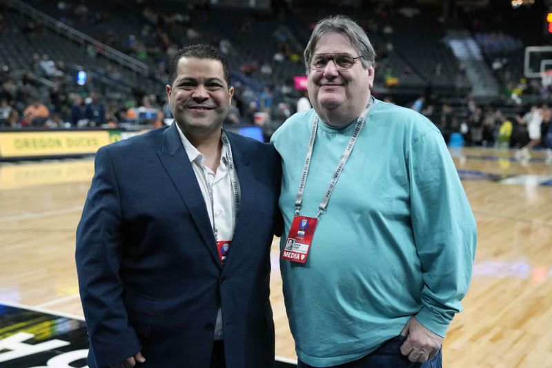 Mar 16, 2024; Las Vegas, NV, USA; Arash Markazi (left) and Steve Carp of The Sporting Tribune pose at the Pac-12 Championship game at T-Mobile Arena. Mandatory Credit: Kirby Lee-USA TODAY Sports