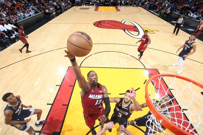 MIAMI, FL - JANUARY 22: Bam Adebayo #13 of the Miami Heat shoots the ball during the game against the New Orleans Pelicans on January 22, 2023 at Miami-Dade Arena in Miami, Florida. NOTE TO USER: User expressly acknowledges and agrees that, by downloading and or using this Photograph, user is consenting to the terms and conditions of the Getty Images License Agreement. Mandatory Copyright Notice: Copyright 2023 NBAE (Photo by Nathaniel S. Butler/NBAE via Getty Images)