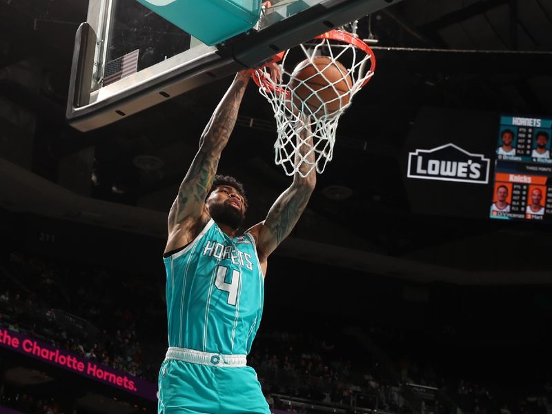 CHARLOTTE, NC - JANUARY 29: Nick Richards #4 of the Charlotte Hornets dunks the ball during the game against the New York Knicks on January 29, 2024 at Spectrum Center in Charlotte, North Carolina. NOTE TO USER: User expressly acknowledges and agrees that, by downloading and or using this photograph, User is consenting to the terms and conditions of the Getty Images License Agreement. Mandatory Copyright Notice: Copyright 2024 NBAE (Photo by Kent Smith/NBAE via Getty Images)