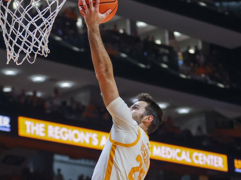 Jan 30, 2024; Knoxville, Tennessee, USA; Tennessee Volunteers guard Santiago Vescovi (25) goes to the basket against the South Carolina Gamecocks during the second half at Thompson-Boling Arena at Food City Center. Mandatory Credit: Randy Sartin-USA TODAY Sports