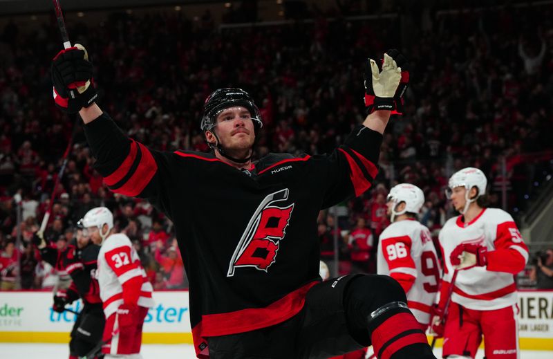 Jan 19, 2024; Raleigh, North Carolina, USA; Carolina Hurricanes right wing Andrei Svechnikov (37) scores a goal against the Detroit Red Wings during the third period at PNC Arena. Mandatory Credit: James Guillory-USA TODAY Sports