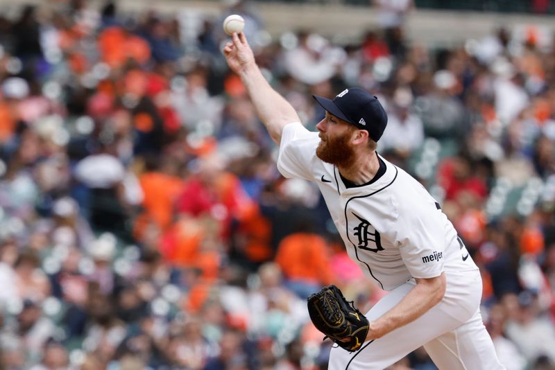 May 28, 2025; Detroit, Michigan, USA;  Detroit Tigers pitcher John Brebbia (49) pitches in the seventh inning against the San Francisco Giants at Comerica Park. Mandatory Credit: Rick Osentoski-Imagn Images