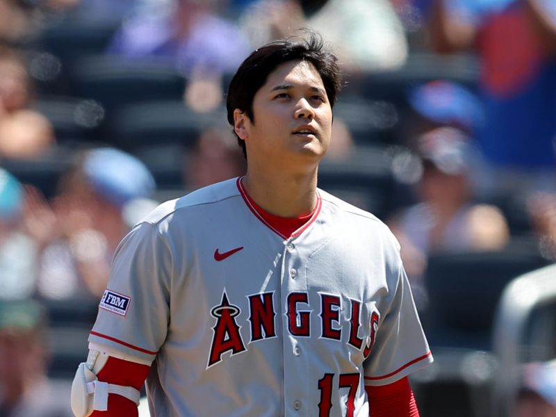 Aug 27, 2023; New York City, New York, USA; Los Angeles Angels designated hitter Shohei Ohtani (17) walks back to the dugout after striking out to end the top of the third inning against the New York Mets at Citi Field. Mandatory Credit: Brad Penner-USA TODAY Sports