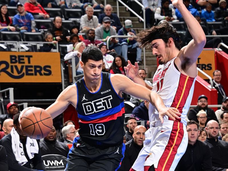 DETROIT, MI - NOVEMBER 12: Simone Fontecchio #19 of the Detroit Pistons drives to the basket during the game against the Miami Heat during the Emirates NBA Cup game on November 12, 2024 at Little Caesars Arena in Detroit, Michigan. NOTE TO USER: User expressly acknowledges and agrees that, by downloading and/or using this photograph, User is consenting to the terms and conditions of the Getty Images License Agreement. Mandatory Copyright Notice: Copyright 2024 NBAE (Photo by Chris Schwegler/NBAE via Getty Images)