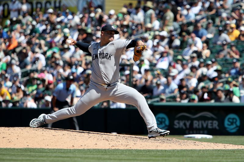 May 10, 2025; West Sacramento, California, USA; New York Yankees pitcher Fernando Cruz (63) throws a pitch against the Athletics during the seventh inning at Sutter Health Park. Mandatory Credit: Dennis Lee-Imagn Images