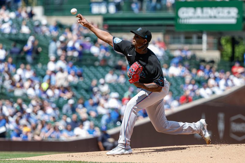 May 5, 2023; Chicago, Illinois, USA; Miami Marlins starting pitcher Edward Cabrera (27) pitches against the Chicago Cubs during the first inning at Wrigley Field. Mandatory Credit: Kamil Krzaczynski-USA TODAY Sports