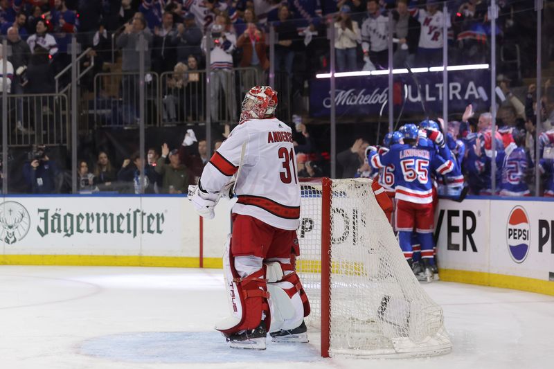 May 13, 2024; New York, New York, USA; Carolina Hurricanes goaltender Frederik Andersen (31) reacts after allowing a short handed goal to New York Rangers defenseman Jacob Trouba (8) during the first period of game five of the second round of the 2024 Stanley Cup Playoffs at Madison Square Garden. Mandatory Credit: Brad Penner-USA TODAY Sports