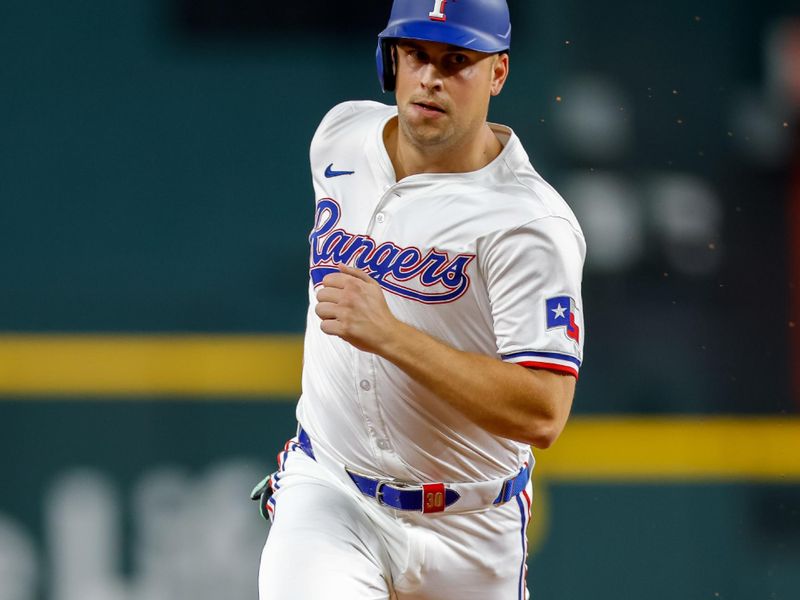 Sep 4, 2024; Arlington, Texas, USA; Texas Rangers first base Nathaniel Lowe (30) circles second base during the sixth inning against the New York Yankees at Globe Life Field. Mandatory Credit: Andrew Dieb-Imagn Images