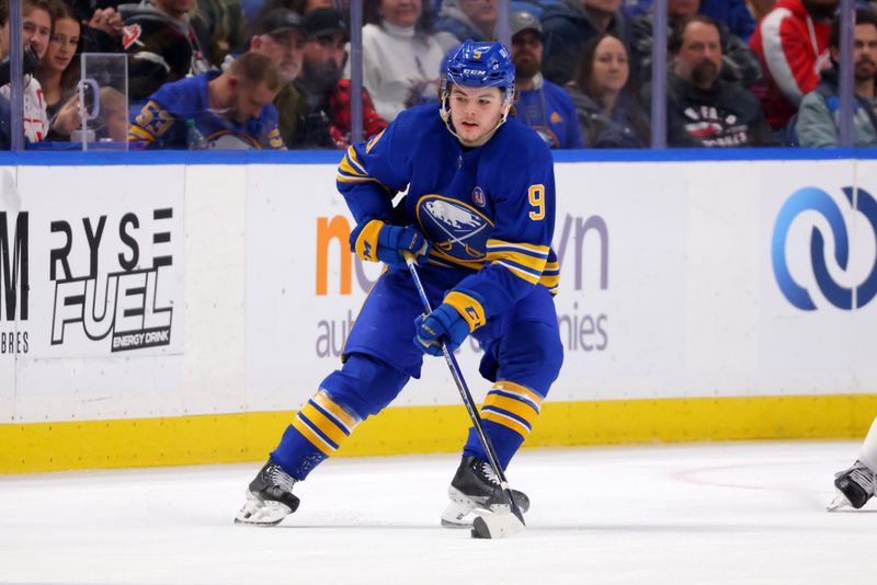 Dec 5, 2023; Buffalo, New York, USA;  Buffalo Sabres left wing Zach Benson (9) looks to make a pass during the first period against the Detroit Red Wings at KeyBank Center. Mandatory Credit: Timothy T. Ludwig-USA TODAY Sports