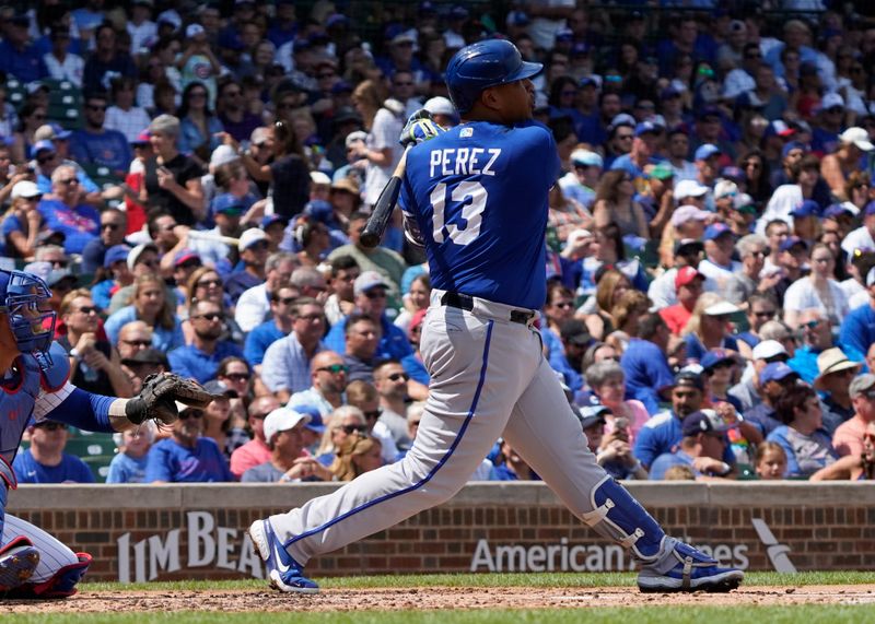 Aug 19, 2023; Chicago, Illinois, USA; Kansas City Royals first baseman Salvador Perez (13) hits a single against the Chicago Cubs during the second inning at Wrigley Field. Mandatory Credit: David Banks-USA TODAY Sports