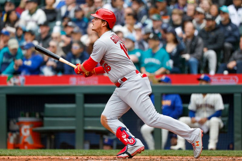 Apr 23, 2023; Seattle, Washington, USA; St. Louis Cardinals second baseman Nolan Gorman (16) hits a three-run home run against the Seattle Mariners during the fourth inning at T-Mobile Park. Mandatory Credit: Joe Nicholson-USA TODAY Sports