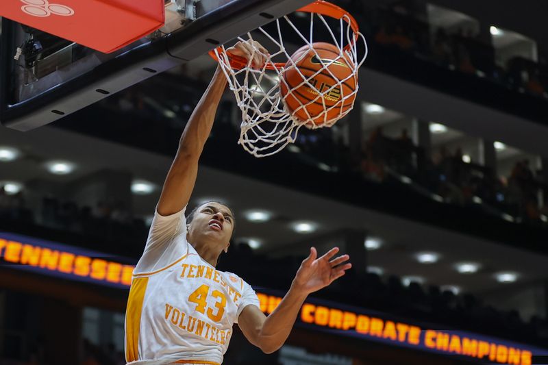 Feb 24, 2024; Knoxville, Tennessee, USA; Tennessee Volunteers guard Cameron Carr (43) dunks the ball against the Texas A&M Aggies during the second half at Thompson-Boling Arena at Food City Center. Mandatory Credit: Randy Sartin-USA TODAY Sports