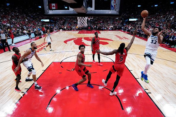 TORONTO, CANADA - OCTOBER 25: Karl-Anthony Towns #32 of the Minnesota Timberwolves shoots the ball during the game against the Toronto Raptors on October 25, 2023 at the Scotiabank Arena in Toronto, Ontario, Canada.  NOTE TO USER: User expressly acknowledges and agrees that, by downloading and or using this Photograph, user is consenting to the terms and conditions of the Getty Images License Agreement.  Mandatory Copyright Notice: Copyright 2023 NBAE (Photo by Mark Blinch/NBAE via Getty Images)