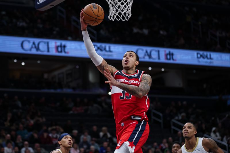 WASHINGTON, DC - JANUARY 05: Kyle Kuzma #33 of the Washington Wizards goes to the basket New Orleans Pelicans during the second half at Capital One Arena on January 5, 2025 in Washington, DC. NOTE TO USER: User expressly acknowledges and agrees that, by downloading and or using this photograph, User is consenting to the terms and conditions of the Getty Images License Agreement. (Photo by Scott Taetsch/Getty Images)