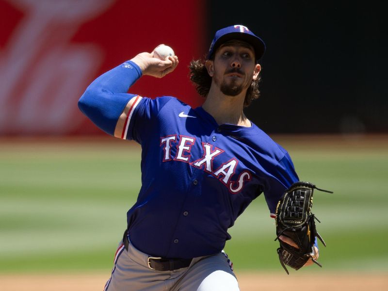 May 8, 2024; Oakland, California, USA; Texas Rangers starting pitcher Michael Lorenzen (23) delivers a pitch against the Oakland Athletics during the first inning at Oakland-Alameda County Coliseum. Mandatory Credit: D. Ross Cameron-USA TODAY Sports