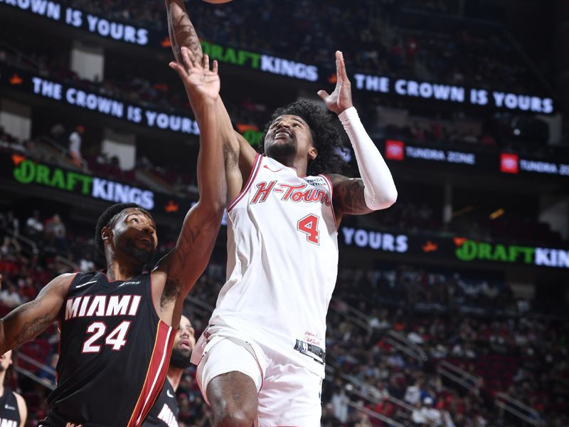 HOUSTON, TX - APRIL 5: Jalen Green #4 of the Houston Rockets drives to the basket during the game against the Miami Heat on April 5, 2024 at the Toyota Center in Houston, Texas. NOTE TO USER: User expressly acknowledges and agrees that, by downloading and or using this photograph, User is consenting to the terms and conditions of the Getty Images License Agreement. Mandatory Copyright Notice: Copyright 2024 NBAE (Photo by Logan Riely/NBAE via Getty Images)