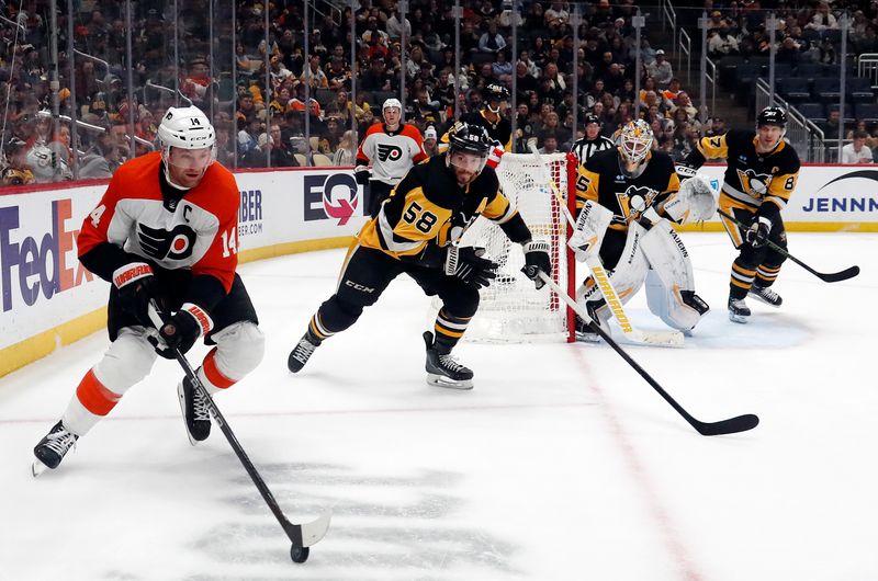 Feb 25, 2024; Pittsburgh, Pennsylvania, USA;   Philadelphia Flyers center Sean Couturier (14) handles the puck against the Pittsburgh Penguins during the third period at PPG Paints Arena. Pittsburgh won 7-6. Mandatory Credit: Charles LeClaire-USA TODAY Sports