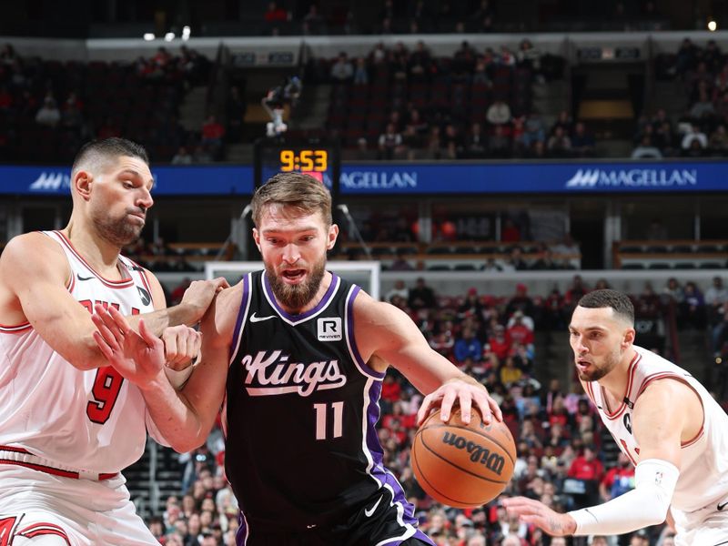 CHICAGO, IL - JANUARY 12: Domantas Sabonis #11 of the Sacramento Kings drives to the basket during the game against the Chicago Bulls on January 12, 2025 at United Center in Chicago, Illinois. NOTE TO USER: User expressly acknowledges and agrees that, by downloading and or using this photograph, User is consenting to the terms and conditions of the Getty Images License Agreement. Mandatory Copyright Notice: Copyright 2025 NBAE (Photo by Jeff Haynes/NBAE via Getty Images)