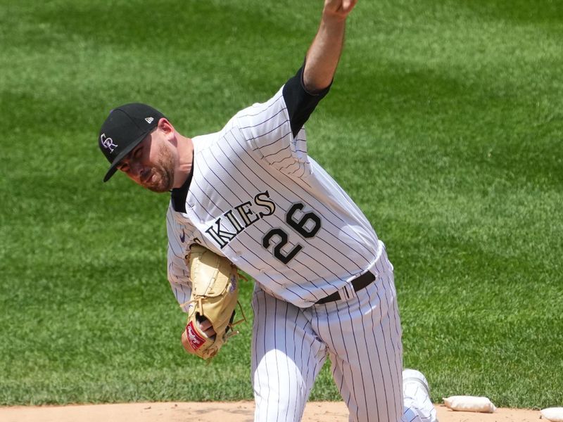 Jul 19, 2023; Denver, Colorado, USA; Colorado Rockies starting pitcher Austin Gomber (26) delivers a pitch in the second inning against the Houston Astros at Coors Field. Mandatory Credit: Ron Chenoy-USA TODAY Sports