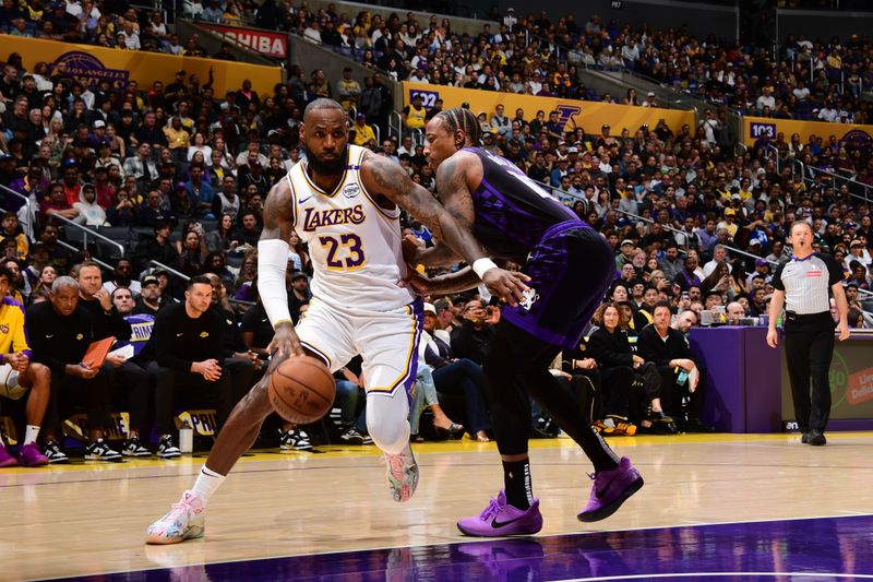 LOS ANGELES, CA - OCTOBER 26: LeBron James #23 of the Los Angeles Lakers drives to the basket during the game against the Sacramento Kings on October 26, 2024 at Crypto.Com Arena in Los Angeles, California. NOTE TO USER: User expressly acknowledges and agrees that, by downloading and/or using this Photograph, user is consenting to the terms and conditions of the Getty Images License Agreement. Mandatory Copyright Notice: Copyright 2024 NBAE (Photo by Adam Pantozzi/NBAE via Getty Images)