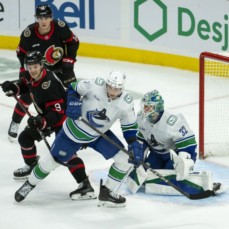 Nov 23, 2024; Ottawa, Ontario, CAN; Ottawa Senators center Josh Norris battles with Vancouver Canucks defenseman Carson Soucy (7) in the third period at the Canadian Tire Centre. Mandatory Credit: Marc DesRosiers-Imagn Images