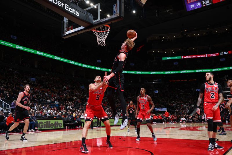 TORONTO, CANADA - JANUARY 31: Gradey Dick #1 of the Toronto Raptors dunks the ball during the game against the Chicago Bulls  on January 31, 2025 at the Scotiabank Arena in Toronto, Ontario, Canada.  NOTE TO USER: User expressly acknowledges and agrees that, by downloading and or using this Photograph, user is consenting to the terms and conditions of the Getty Images License Agreement.  Mandatory Copyright Notice: Copyright 2025 NBAE (Photo by Vaughn Ridley/NBAE via Getty Images)