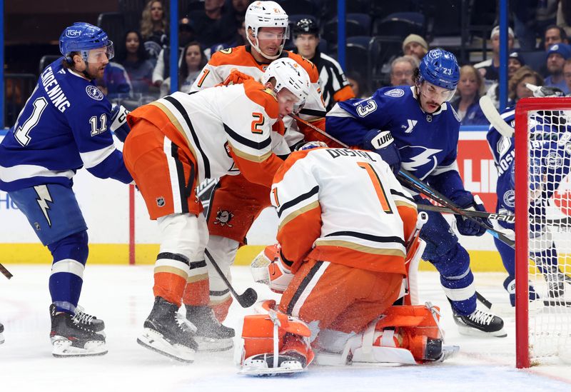 Jan 16, 2025; Tampa, Florida, USA; Tampa Bay Lightning right wing Cam Atkinson (13) shoots as Anaheim Ducks goaltender Lukas Dostal (1) defends during the first period at Amalie Arena. Mandatory Credit: Kim Klement Neitzel-Imagn Images