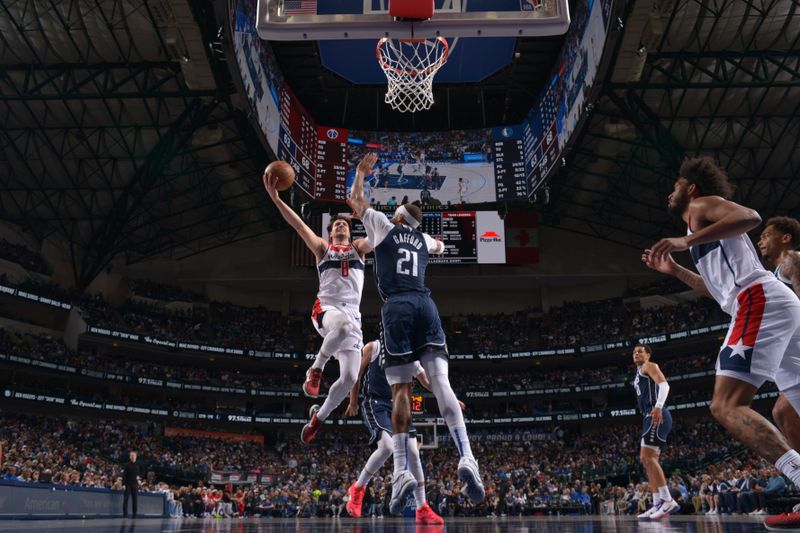 DALLAS, TX - FEBRUARY 12: Deni Avdija #8 of the Washington Wizards drives to the basket during the game against the Dallas Mavericks on February 12, 2024 at the American Airlines Center in Dallas, Texas. NOTE TO USER: User expressly acknowledges and agrees that, by downloading and or using this photograph, User is consenting to the terms and conditions of the Getty Images License Agreement. Mandatory Copyright Notice: Copyright 2024 NBAE (Photo by Glenn James/NBAE via Getty Images)