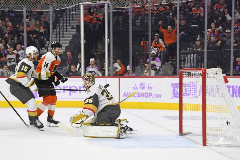 Nov 25, 2024; Philadelphia, Pennsylvania, USA; Philadelphia Flyers center Sean Couturier (14) scores a goal past Vegas Golden Knights goaltender Ilya Samsonov (35) during the first period at Wells Fargo Center. Mandatory Credit: Eric Hartline-Imagn Images