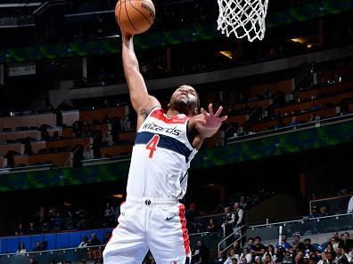 ORLANDO, FL - NOVEMBER 29: Jared Butler #4 of the Washington Wizards drives to the basket during the game against the Orlando Magic on November 29, 2023 at Amway Center in Orlando, Florida. NOTE TO USER: User expressly acknowledges and agrees that, by downloading and or using this photograph, User is consenting to the terms and conditions of the Getty Images License Agreement. Mandatory Copyright Notice: Copyright 2023 NBAE (Photo by Gary Bassing/NBAE via Getty Images)