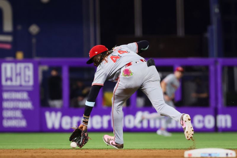 Aug 5, 2024; Miami, Florida, USA; Cincinnati Reds shortstop Elly De La Cruz (44) catches a ground ball but cannot retire Miami Marlins right fielder Jesus Sanchez (not pictured) during the fourth inning at loanDepot Park. Mandatory Credit: Sam Navarro-USA TODAY Sports