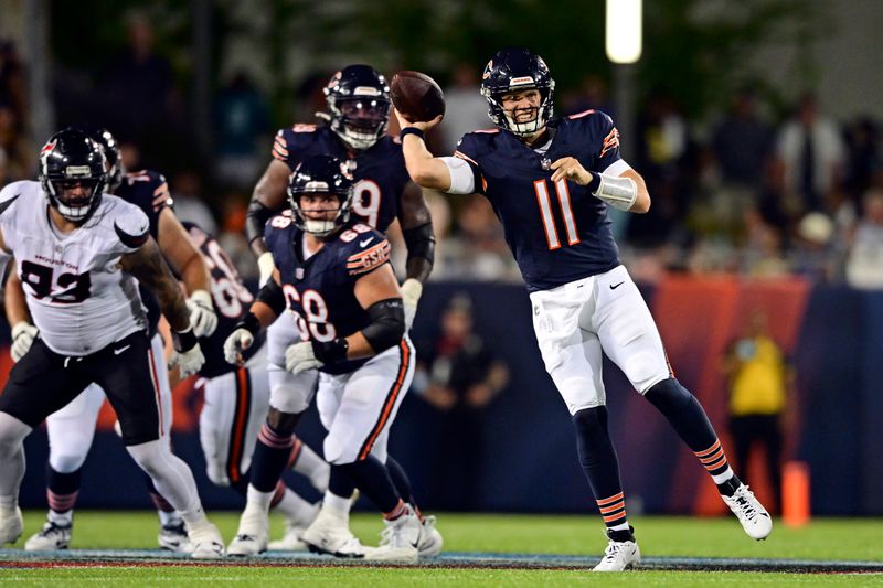 Chicago Bears quarterback Brett Rypien looks to throw a pass during the second half of an NFL exhibition Hall of Fame football game against the Houston Texans, Thursday, Aug. 1, 2024, in Canton, Ohio. (AP Photo/David Dermer)