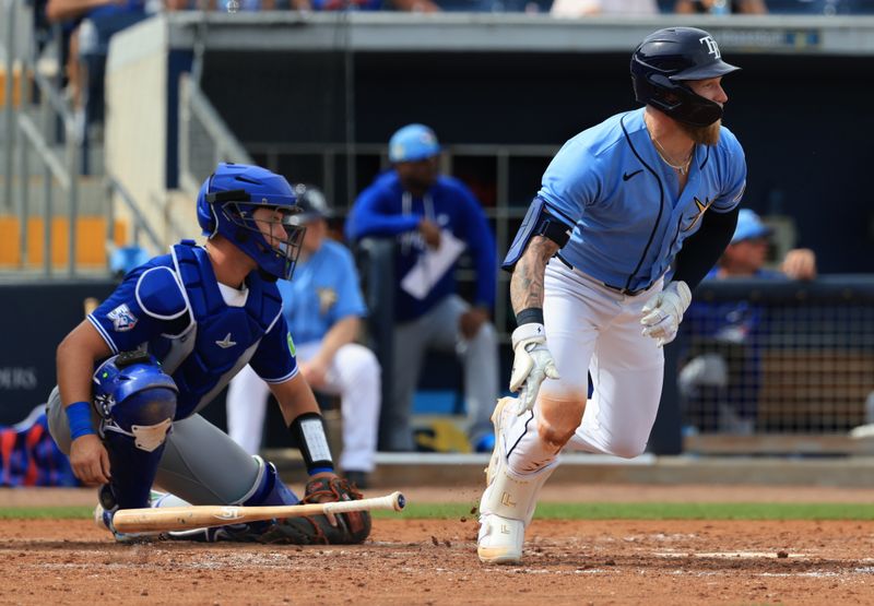 Feb 27, 2026; Port Charlotte, Florida, USA; Tampa Bay Rays right fielder Jake Fraley (17) singles against the Toronto Blue Jays during the fourth inning at Charlotte Sports Park. Mandatory Credit: Kim Klement Neitzel-Imagn Images