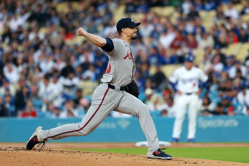 May 3, 2024; Los Angeles, California, USA;  Atlanta Braves pitcher Charlie Morton (50) pitches in the first inning against the Los Angeles Dodgers at Dodger Stadium. Mandatory Credit: Kiyoshi Mio-USA TODAY Sports