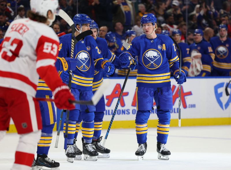 Dec 5, 2023; Buffalo, New York, USA;  Buffalo Sabres defenseman Rasmus Dahlin (26) celebrates his goal with teammates during the second period against the Detroit Red Wings at KeyBank Center. Mandatory Credit: Timothy T. Ludwig-USA TODAY Sports