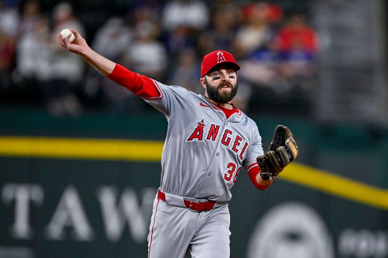 Sep 5, 2024; Arlington, Texas, USA; Los Angeles Angels second baseman Michael Stefanic (38) throws to first base during the game against the Texas Rangers at Globe Life Field. Mandatory Credit: Jerome Miron-Imagn Images